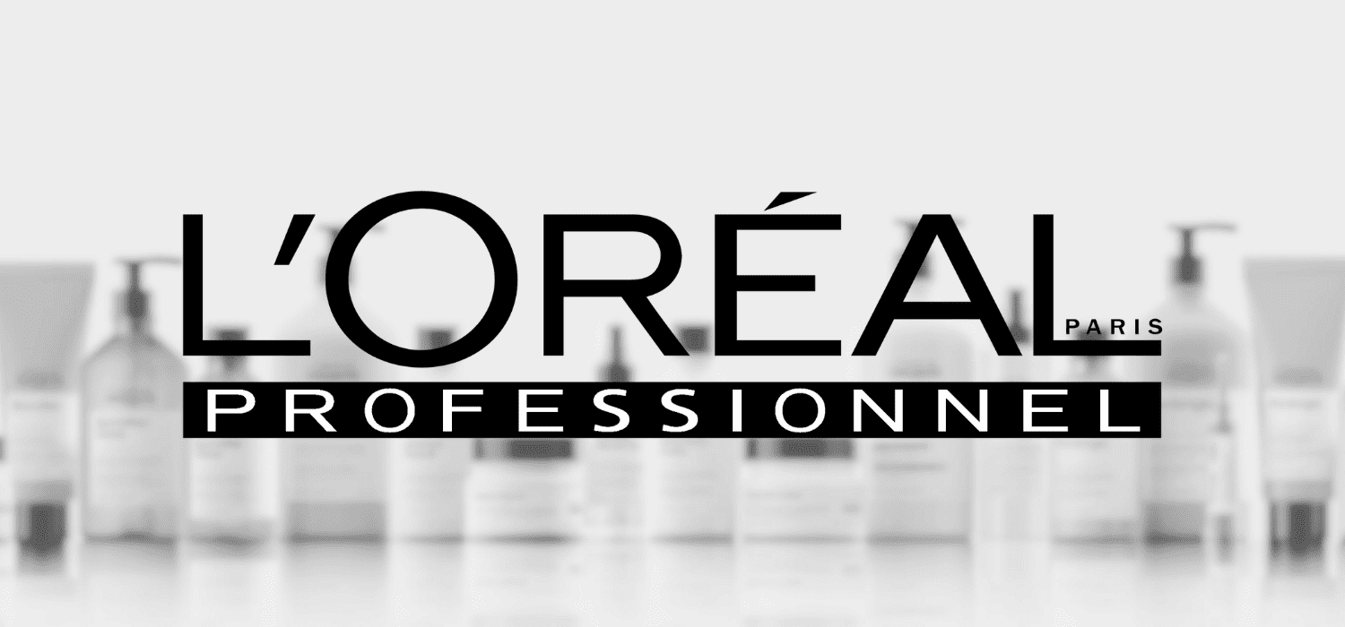 L'Oréal Professionnel logo with blurred hair products in the background.
